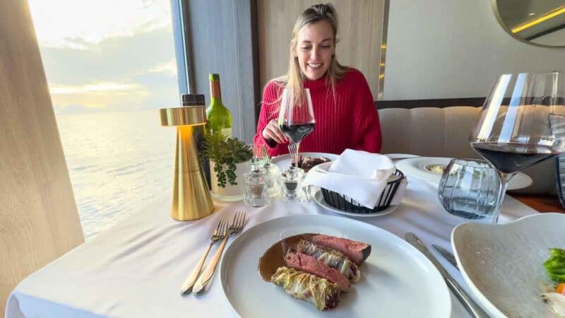 woman eating in the dinning room on an Antartica cruise 