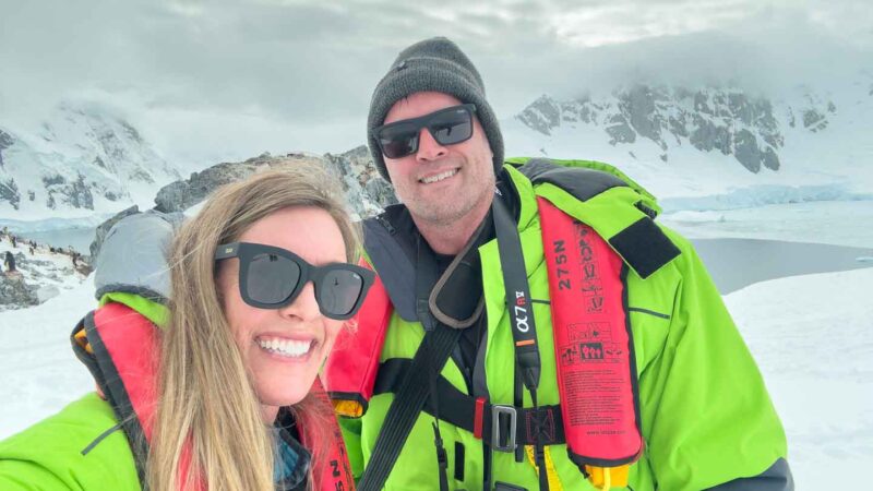 Couple in Antarctica on warm day