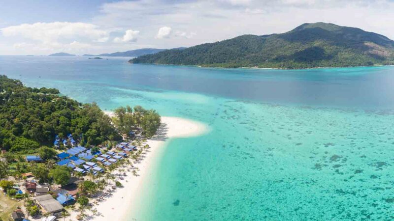 Aerial Drone View of North point beach Koh Lipe the furthest end of Sunrise Beach with white sand and clear water