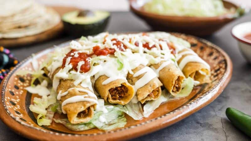 tacos dorados on a plate 