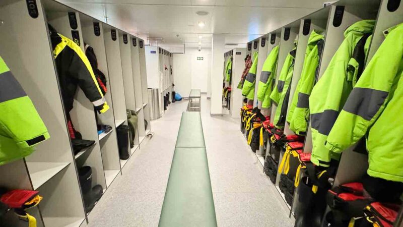 mudroom on cruise ship with boots for Antarctica and Antarctica coats