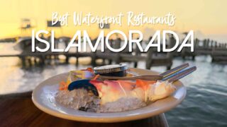 snow crab claw on a plate of an Islamorada waterfront restaurant at sunset - Featured image with white text